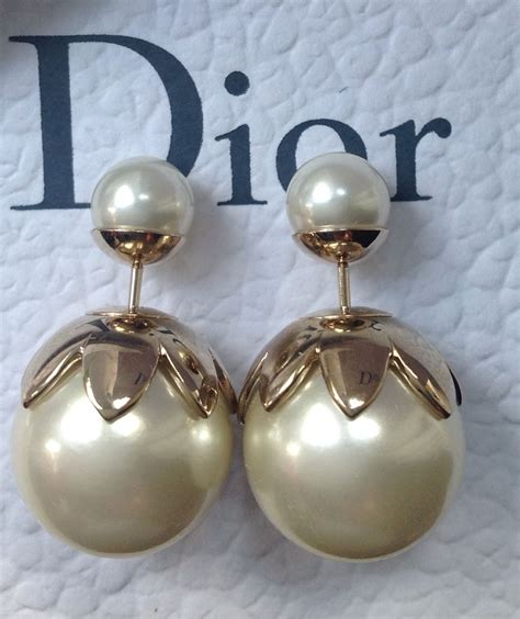 christian dior tribal earrings|Dior mise en earrings.